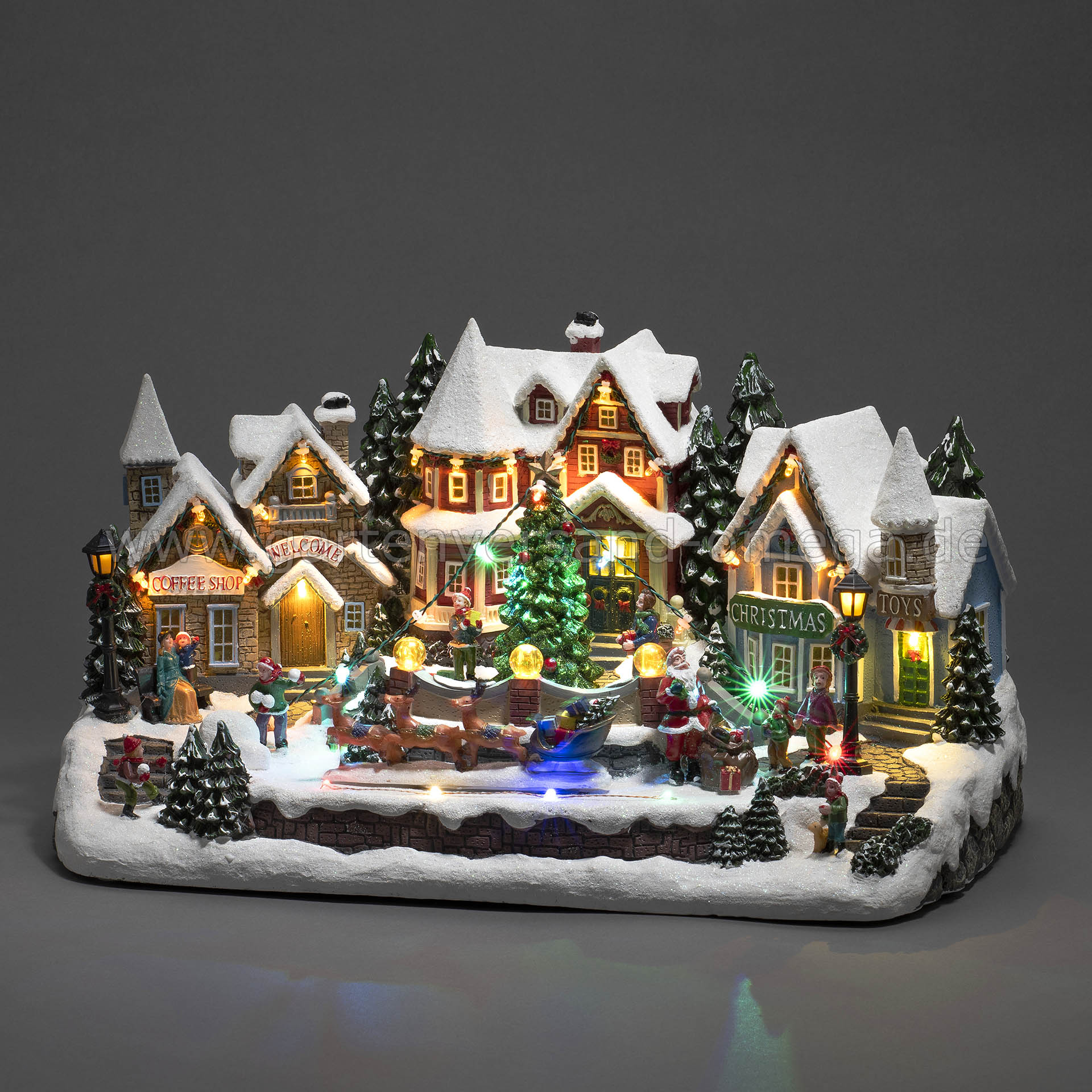 Dekohäuschen Weihnachtshäuschen Weihnachten, Winterlandschaft Omega | und mit Dekoration Animation, Weihnachten mit beleuchtet, Rentierschlitten Häuser Gartenversand Polyresin - LED-Haus, Häuser, Musik LED-Szenerie bewegtem Weihnachtsbeleuchtung
