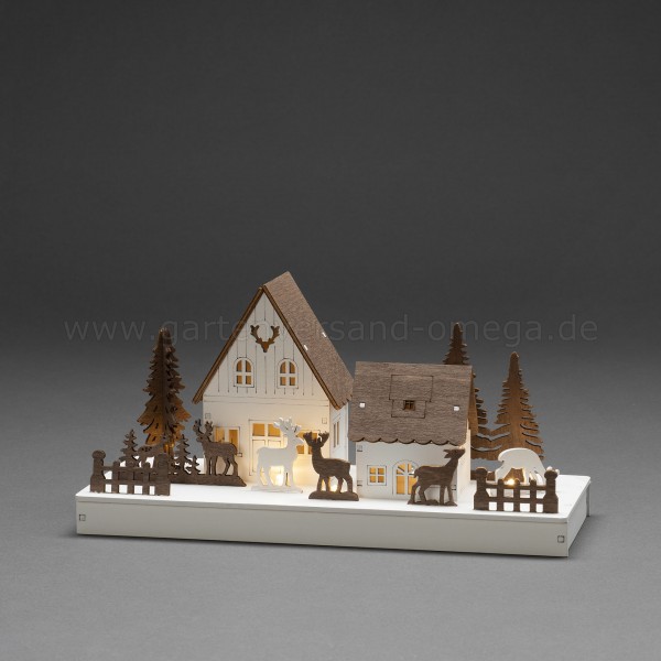 LED-Holzsilhouette Waldhäuser mit Rentieren